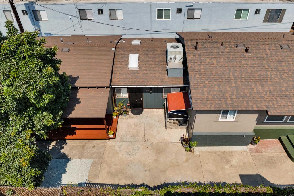 9015-9017 Campo Road Spring Valley, CA 91977 - Photo 51 of 60 an aerial view of a house with swimming pool