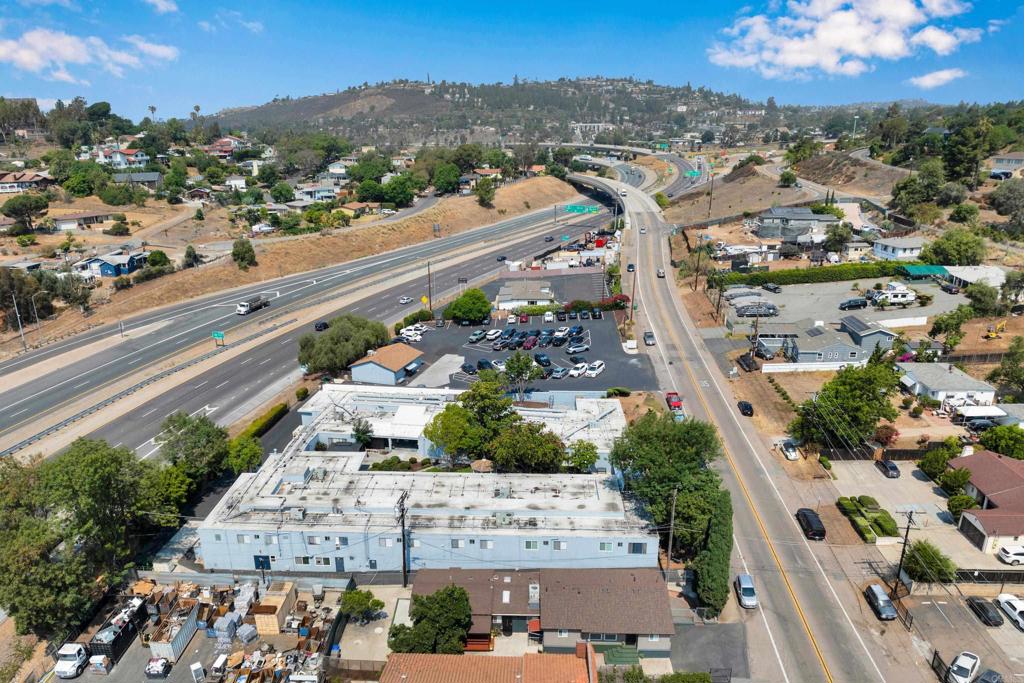 9015-9017 Campo Road Spring Valley, CA 91977 - Photo 58 of 60 an aerial view of residential houses with outdoor space and parking