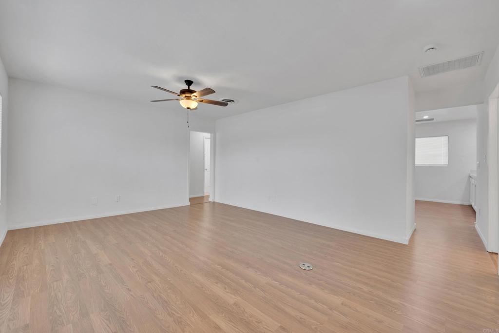 9015-9017 Campo Road Spring Valley, CA 91977 - Photo 7 of 60 a view of an empty room with a window