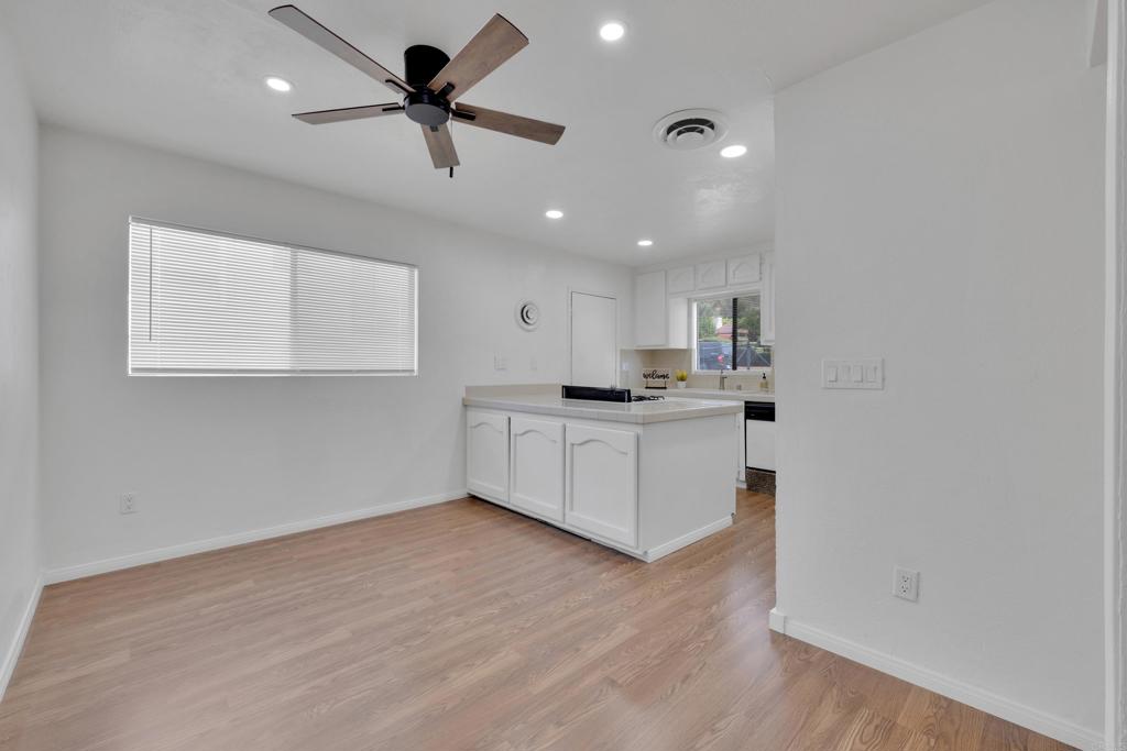 9015-9017 Campo Road Spring Valley, CA 91977 - Photo 9 of 60 a view of kitchen with sink microwave and cabinets