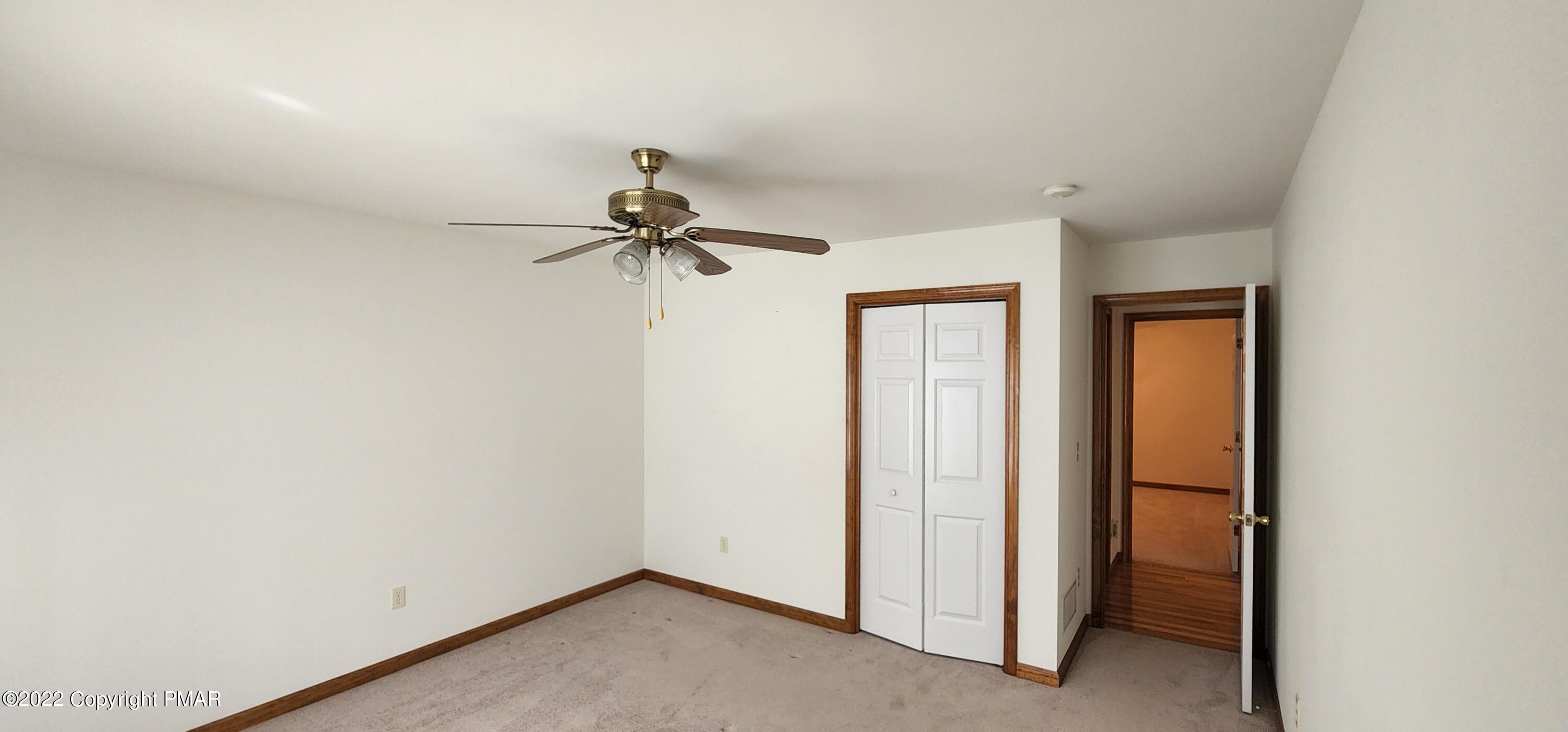 203 Sutton Place Pocono Summit, PA 18346 - Photo 17 of 22 a view of a hallway with a closet