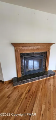 a living room with a fireplace