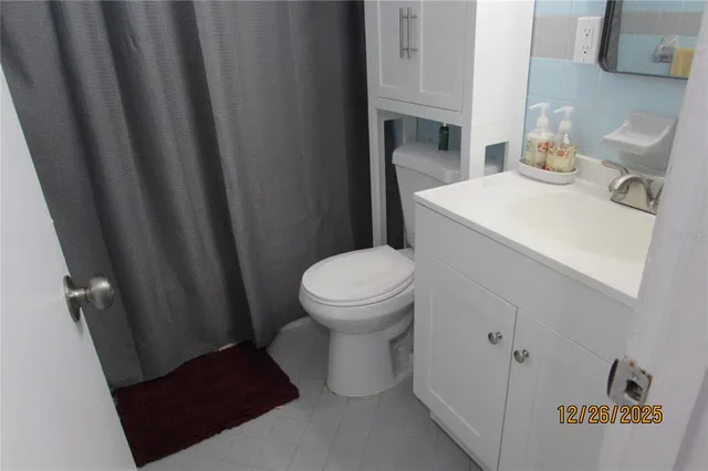a bathroom with a sink and a toilet