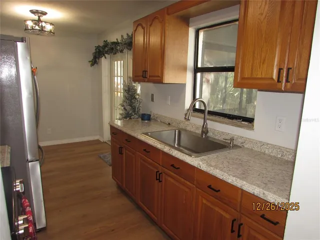 a bathroom with a sink a vanity and a mirror