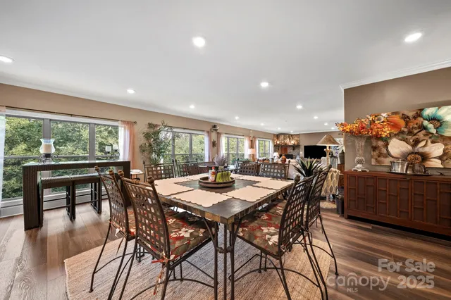 a view of a dining room with furniture window and outside view