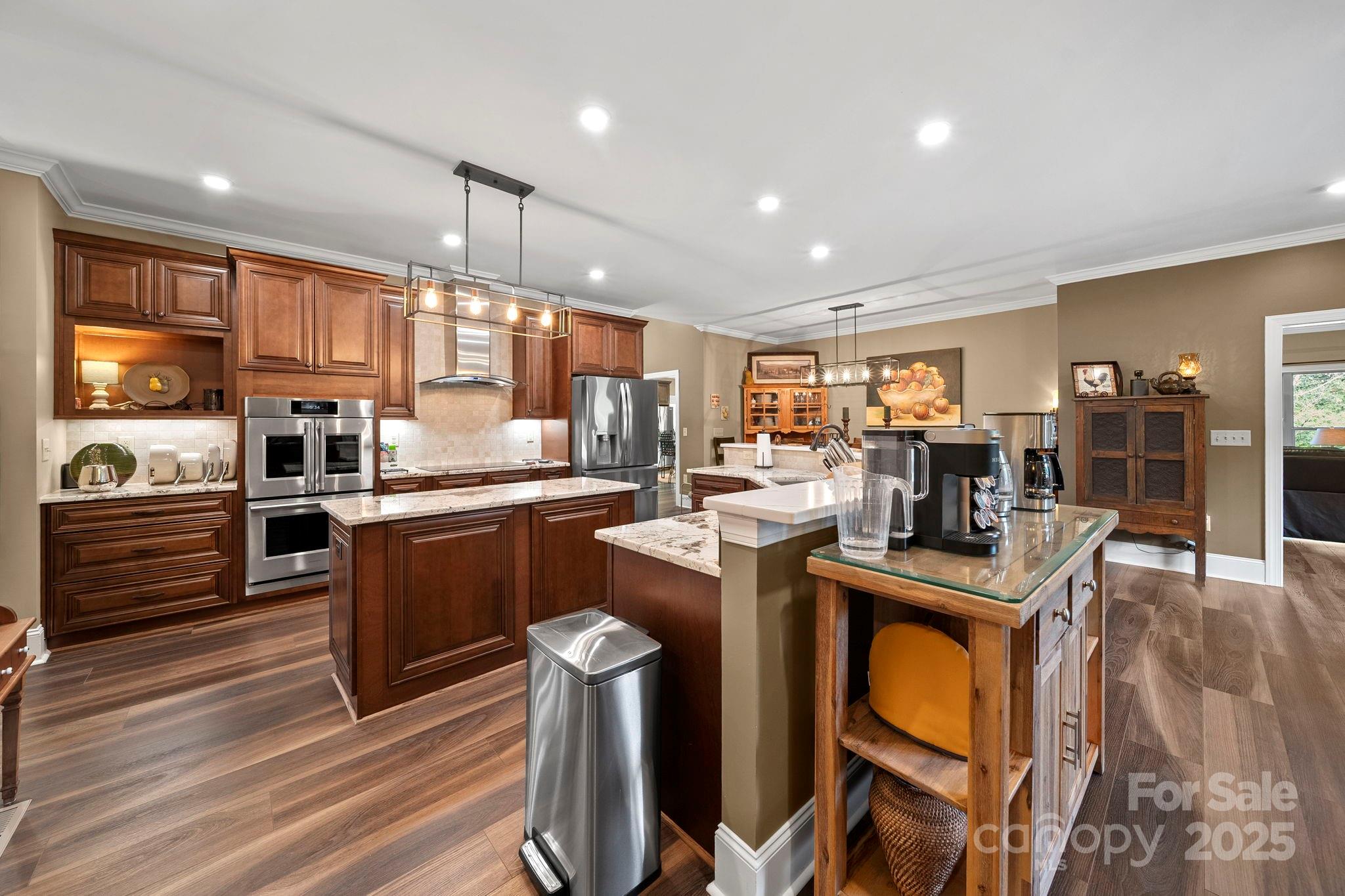 5702 Army Road Marshville, NC 28103 - Photo 29 of 48 a kitchen with counter top space cabinets and appliances
