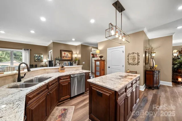 a kitchen with a stove sink and a refrigerator