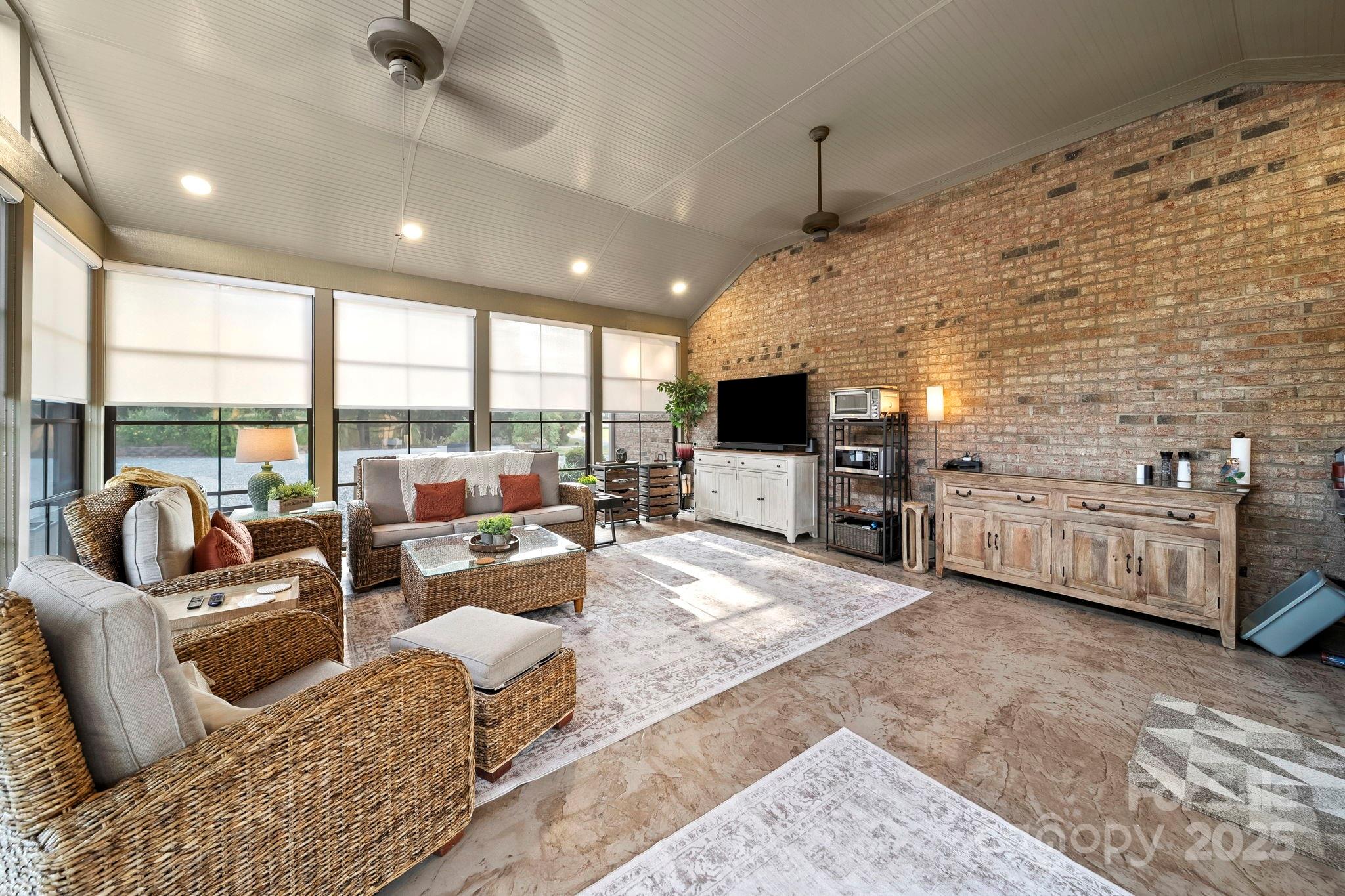 5702 Army Road Marshville, NC 28103 - Photo 40 of 48 a living room with furniture and flat screen tv