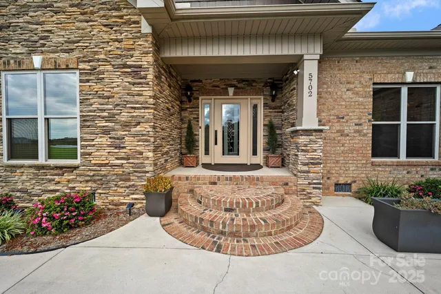 a view of a entryway door front of house