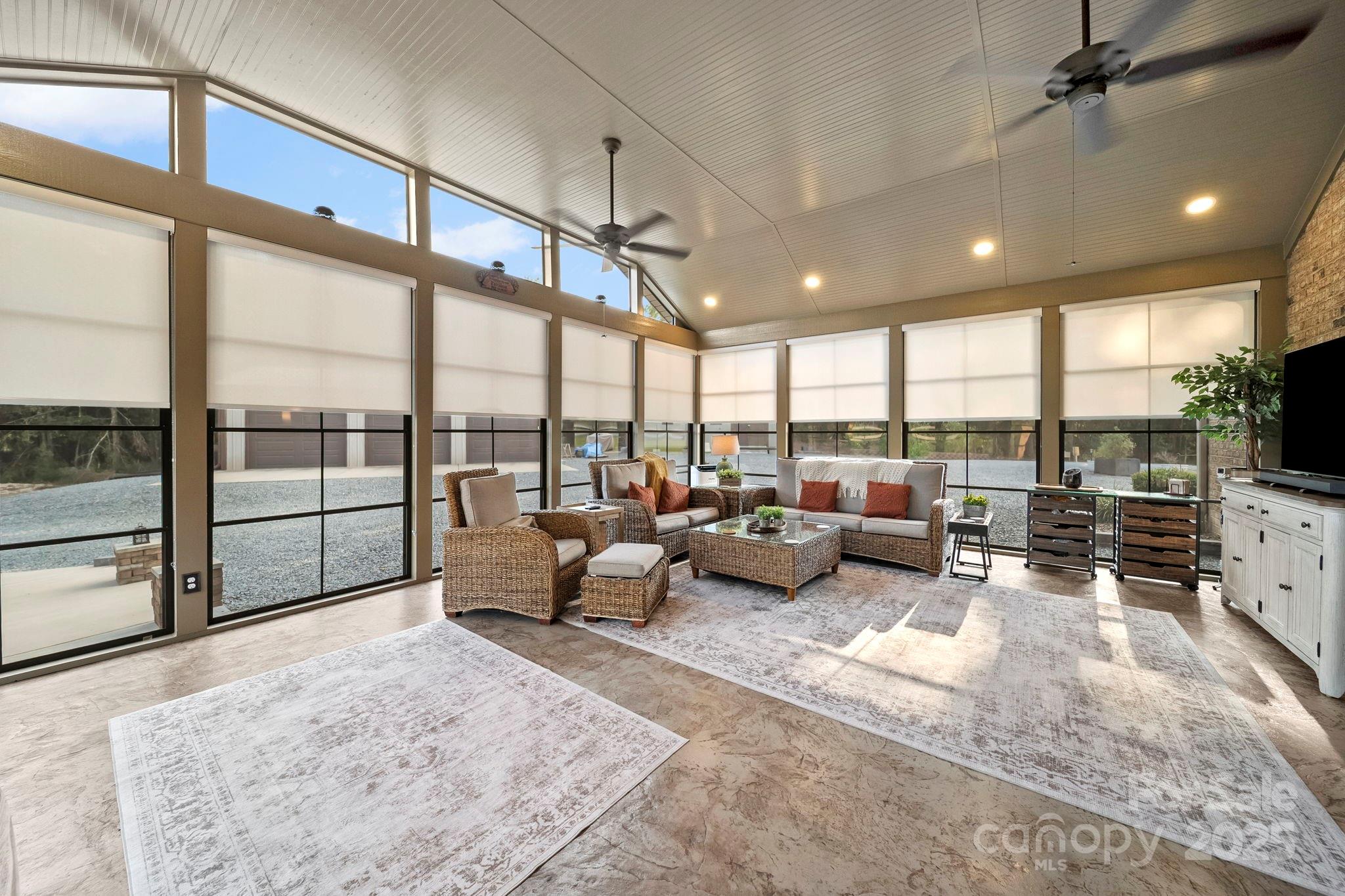 5702 Army Road Marshville, NC 28103 - Photo 41 of 48 a living room with furniture and a flat screen tv