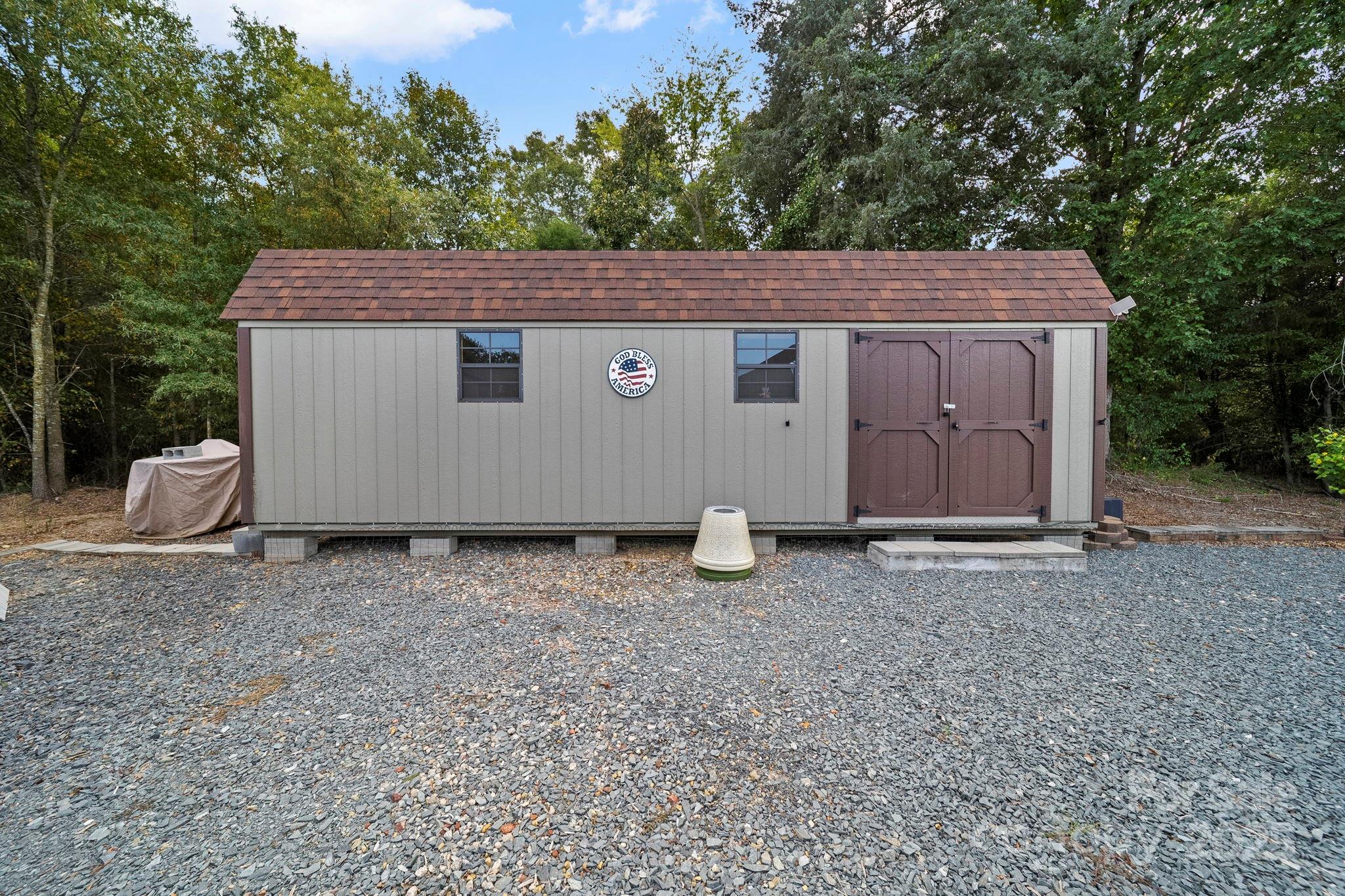 5702 Army Road Marshville, NC 28103 - Photo 45 of 48 a view of a house with a yard