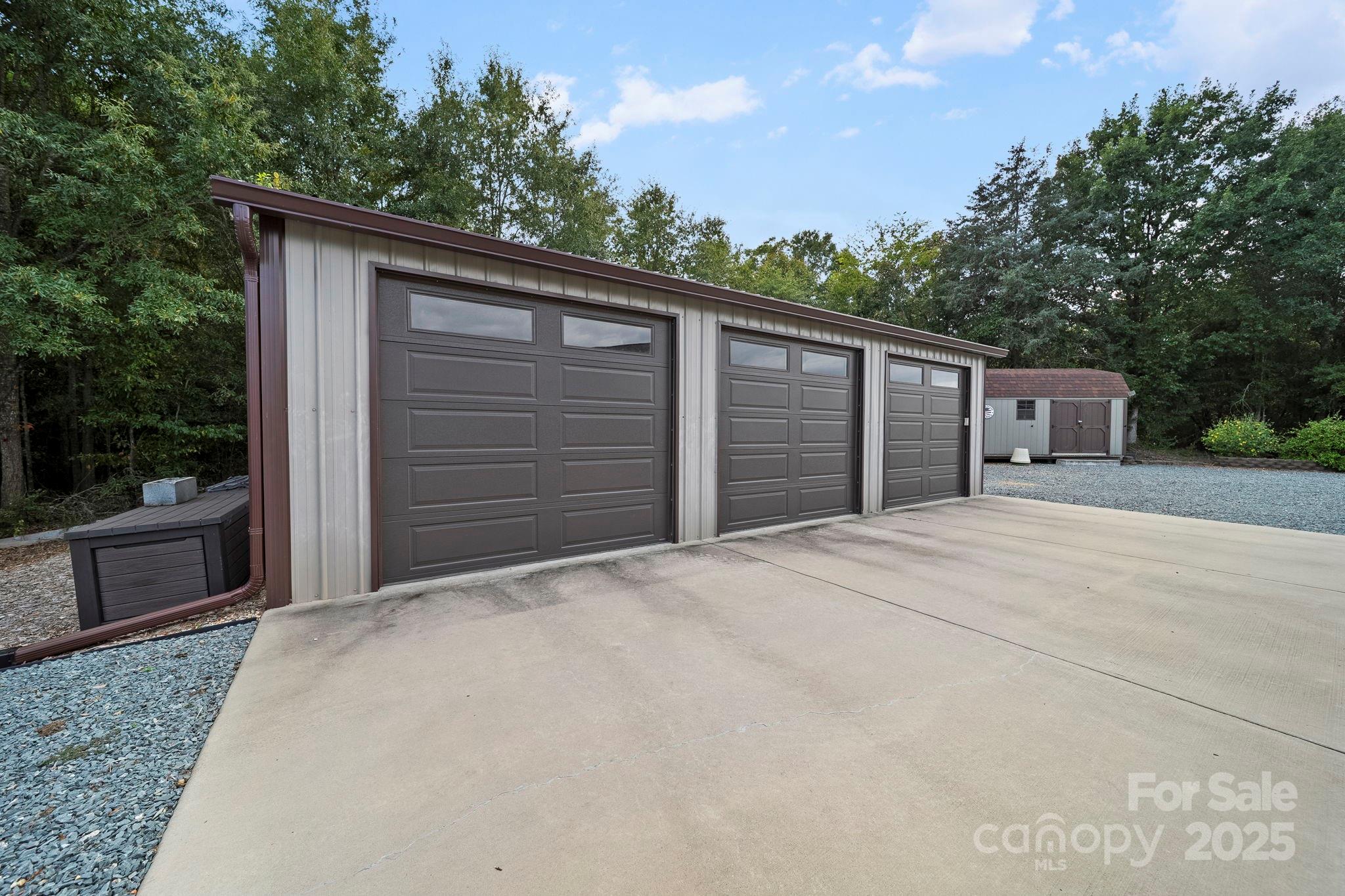 5702 Army Road Marshville, NC 28103 - Photo 46 of 48 a front view of a house with a yard and garage