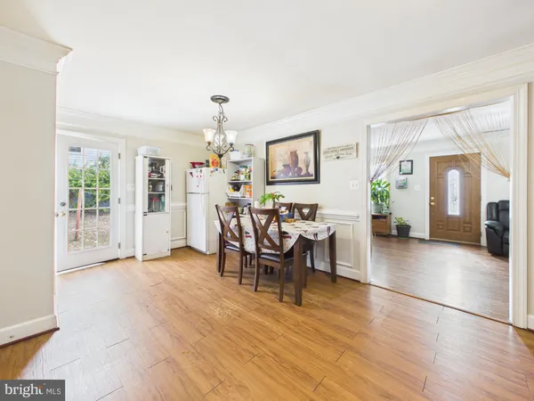 a view of a livingroom and dining room