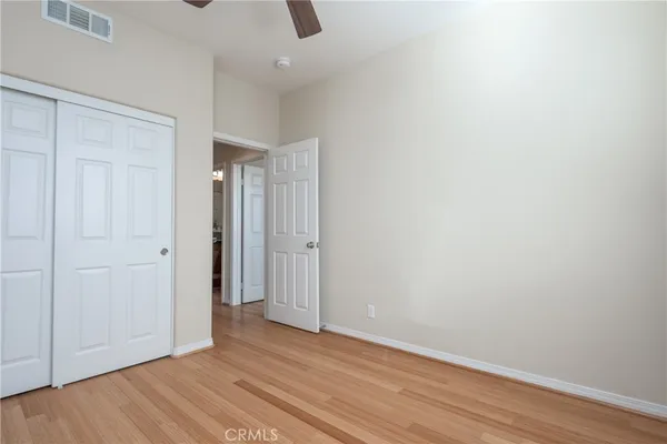a bathroom with a sink a large mirror and a bathtub