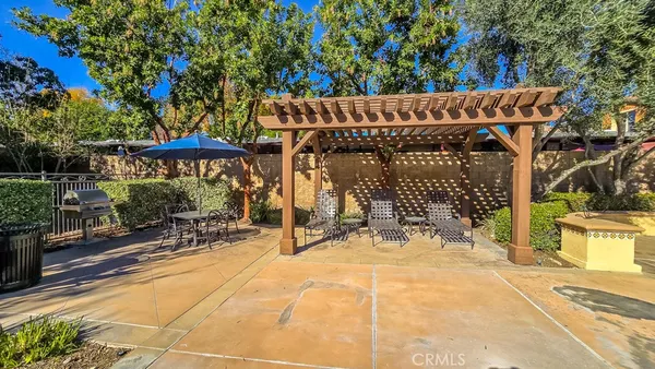 an aerial view of a swimming pool and outdoor space