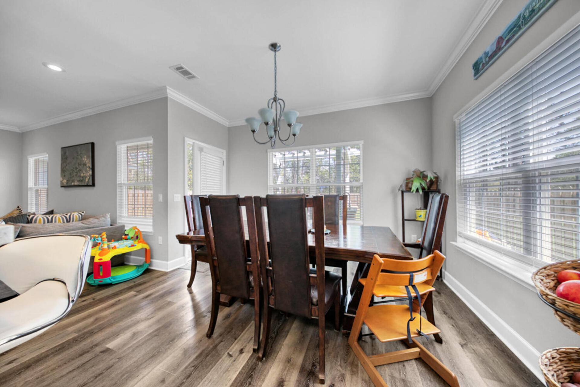 507 Johnson Street Valparaiso, FL 32580 - Photo 17 of 40 a view of a dining room with furniture and window
