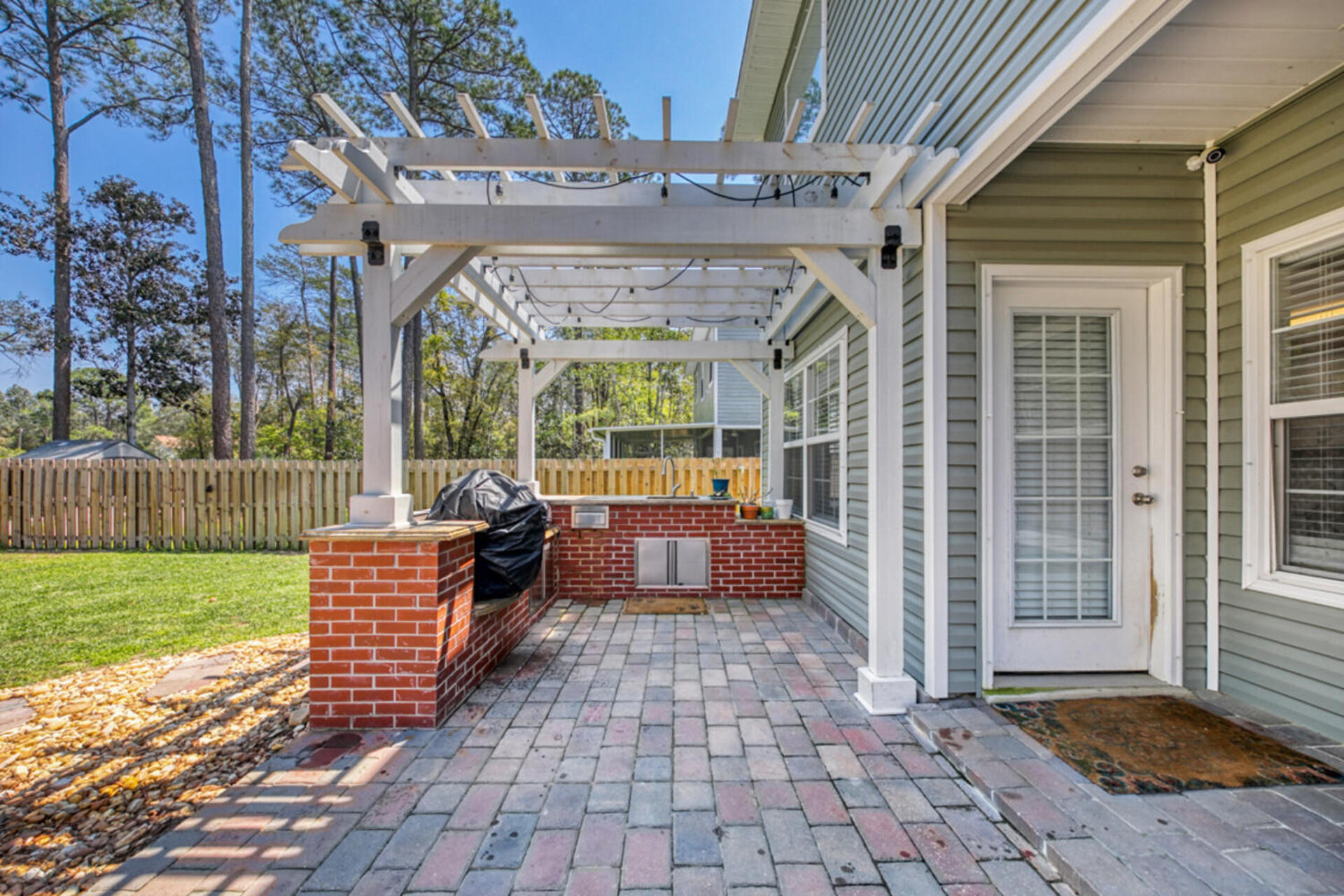 507 Johnson Street Valparaiso, FL 32580 - Photo 19 of 40 a view of living room with furniture and a yard