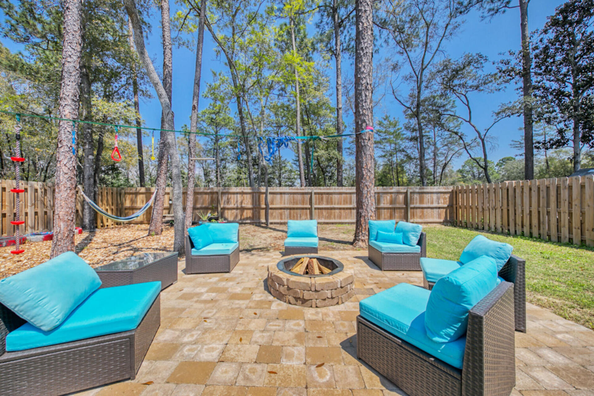 507 Johnson Street Valparaiso, FL 32580 - Photo 20 of 40 a view of a backyard with swimming pool and sitting area