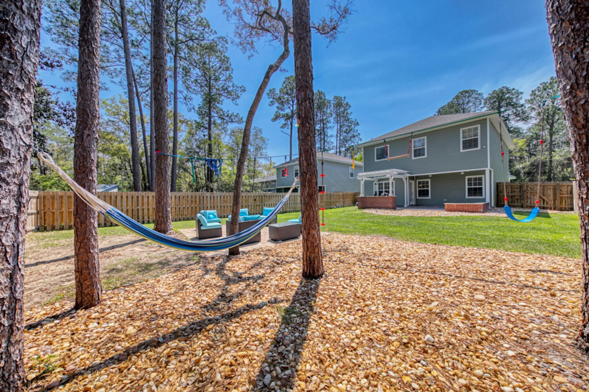 507 Johnson Street Valparaiso, FL 32580 - Photo 21 of 40 a view of a house with a yard