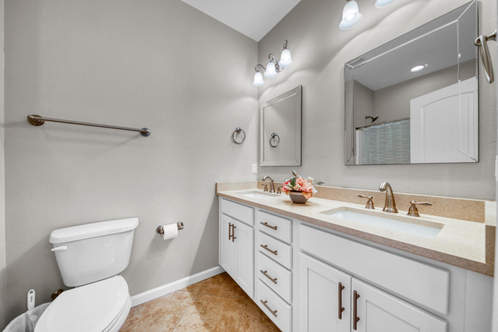 507 Johnson Street Valparaiso, FL 32580 - Photo 33 of 40 a bathroom with a toilet sink and mirror