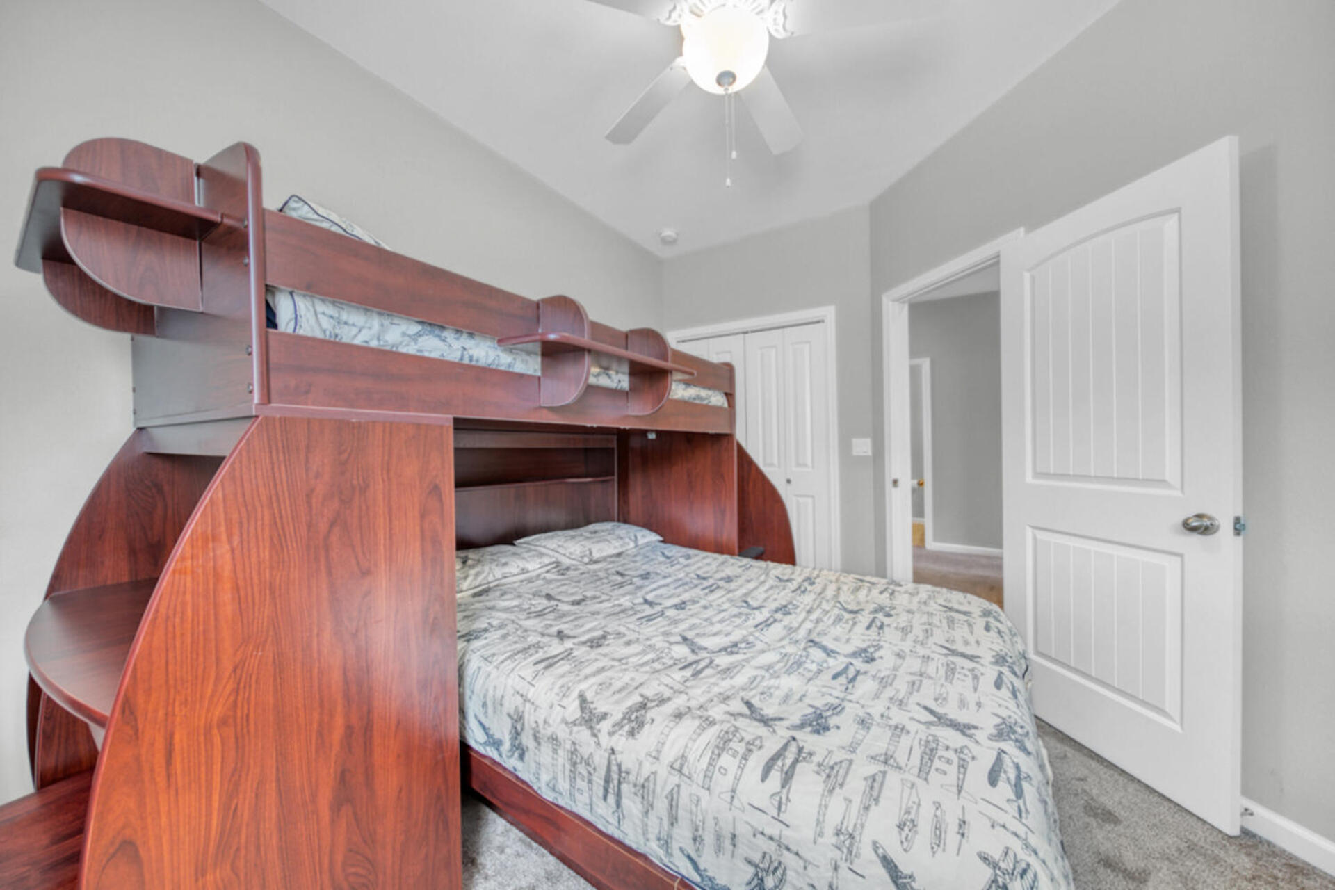 507 Johnson Street Valparaiso, FL 32580 - Photo 37 of 40 a bedroom with a bed and a dresser