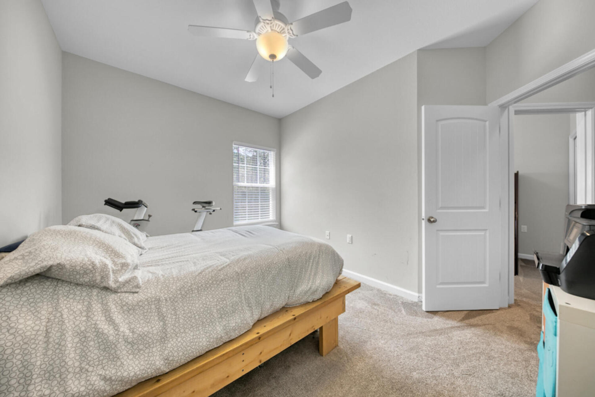 507 Johnson Street Valparaiso, FL 32580 - Photo 39 of 40 a bedroom with a bed and a ceiling fan