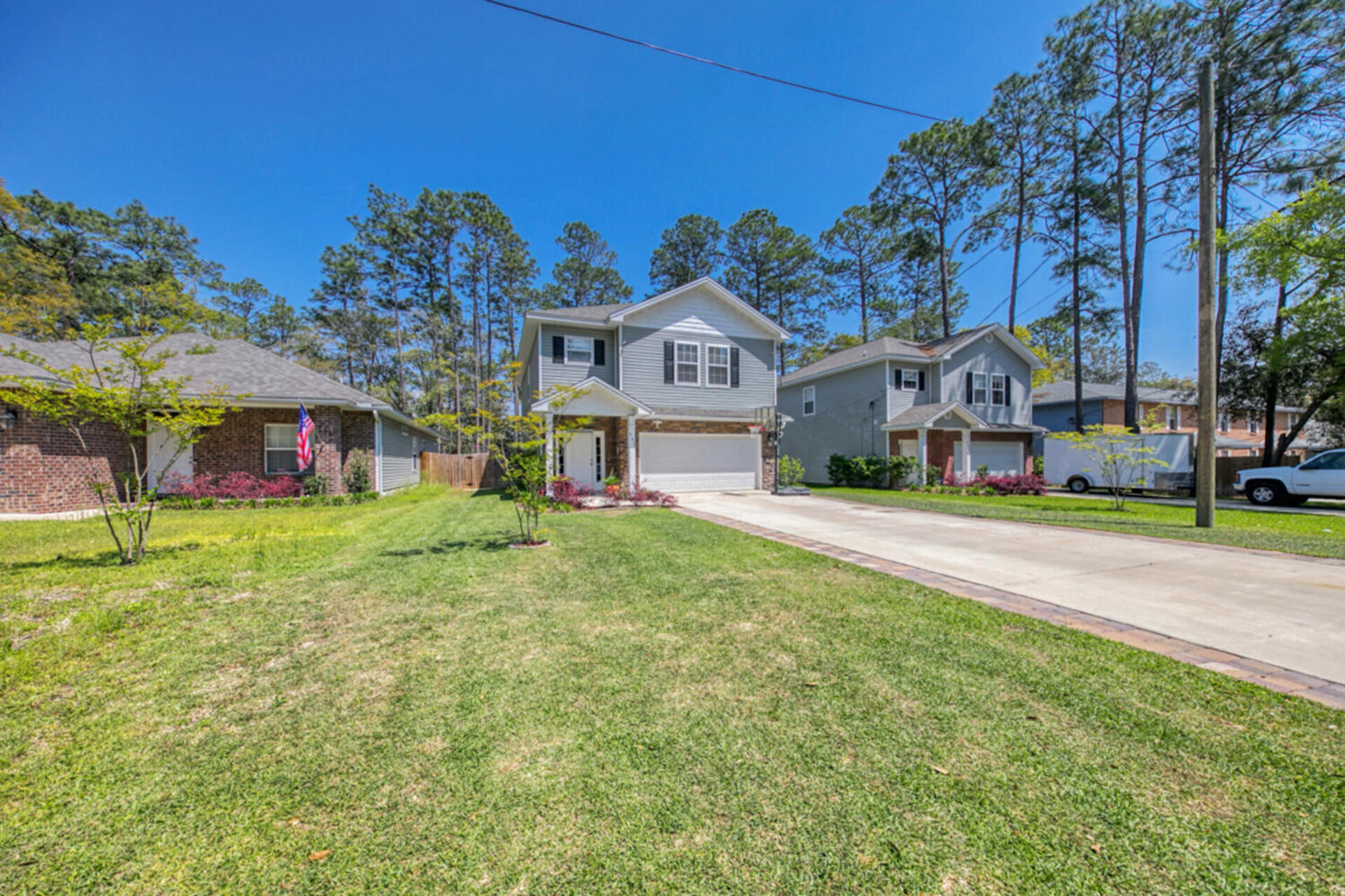 507 Johnson Street Valparaiso, FL 32580 - Photo 40 of 40 a front view of a house with a yard