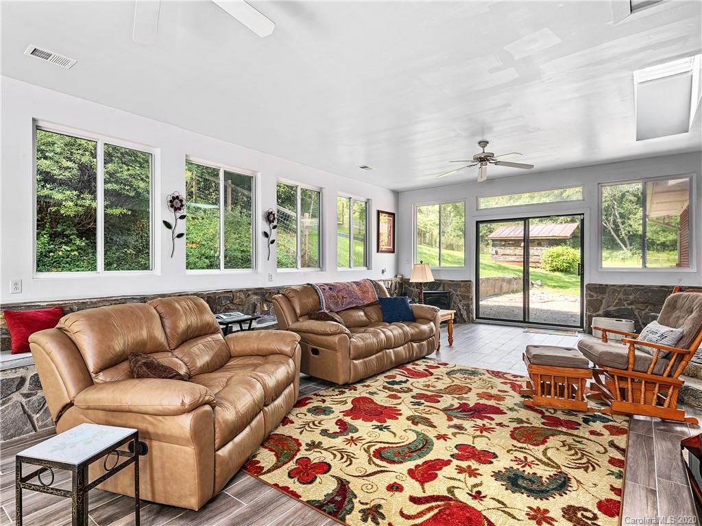 3691 Max Patch Road Clyde, NC 28721 - Photo 8 of 15 a living room with furniture and a large window
