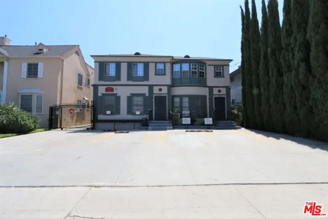 a view of a building with a street