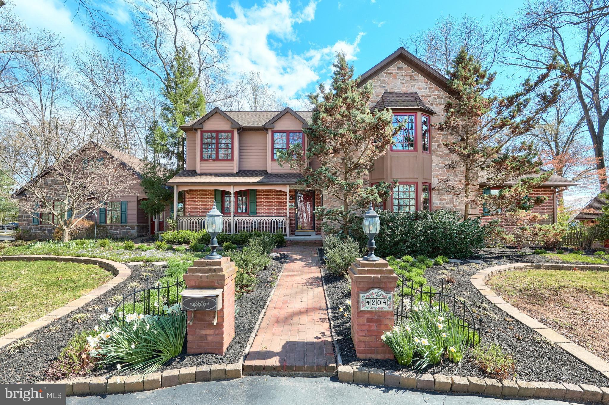 4204 Grandview Road Hanover, PA 17331 - Photo 2 of 77 a front view of a house with garden