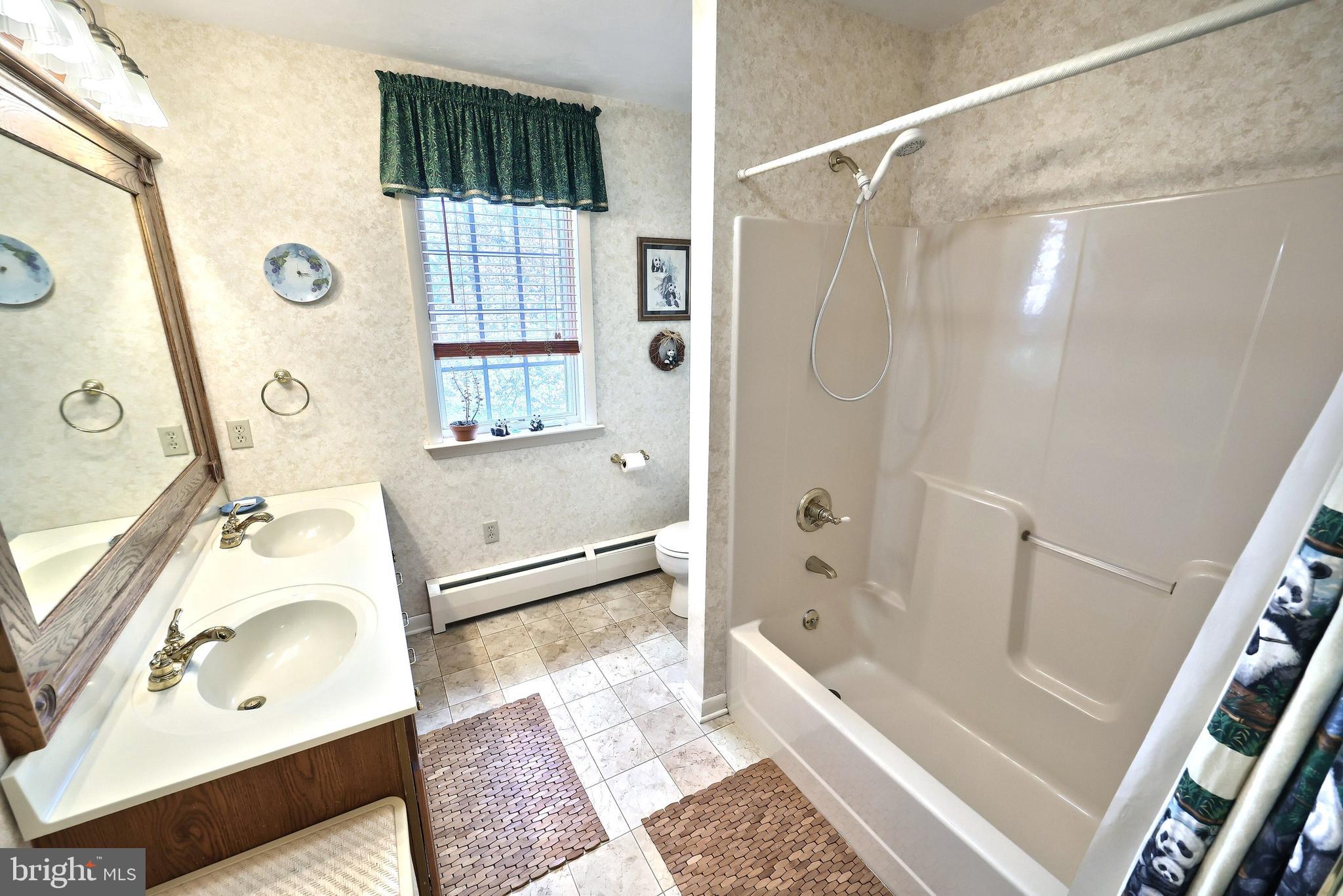 4204 Grandview Road Hanover, PA 17331 - Photo 51 of 77 a bathroom with a tub sink and mirror