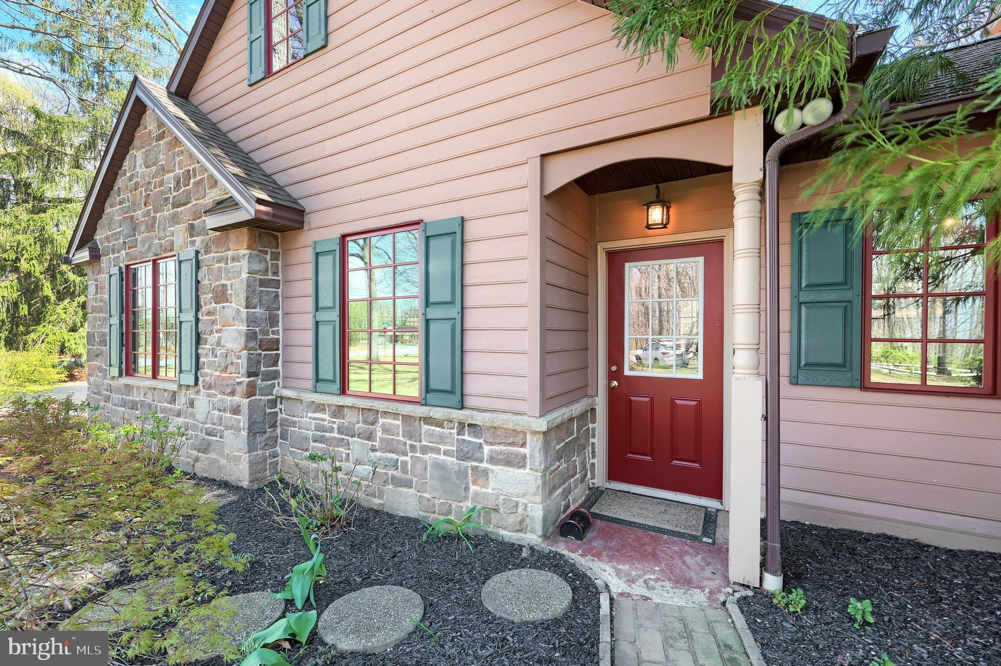 4204 Grandview Road Hanover, PA 17331 - Photo 6 of 77 a view of a front of a house with a large window and potted plants