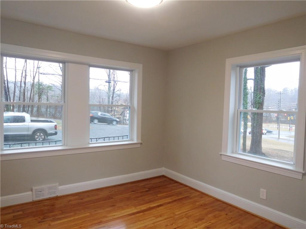 413 Motor Road Winston-Salem, NC 27105 - Photo 17 of 29 BR 1 (there is not a true Primary in this home). This Bedroom is located at the front of the home. Plenty of Natural Light.