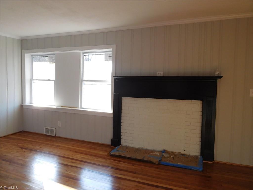 413 Motor Road Winston-Salem, NC 27105 - Photo 4 of 29 Spacious Living Room w/hardwoods. Tons of Natural Light. Spacious Room.