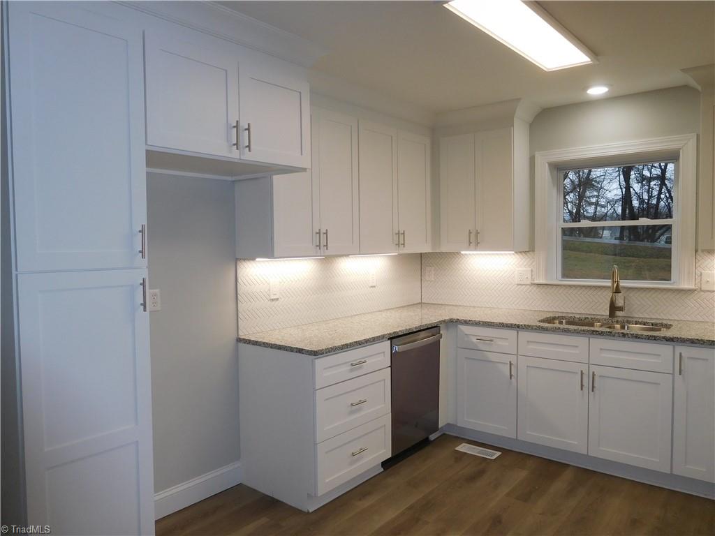 413 Motor Road Winston-Salem, NC 27105 - Photo 8 of 29 Built-in Pantry for additional storage.