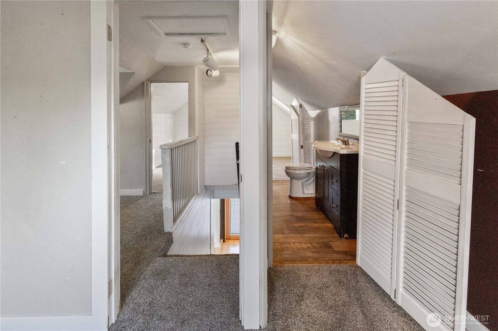 312 Nevada Drive Longview, WA 98632 - Photo 11 of 27 a view of a hallway with a bathroom