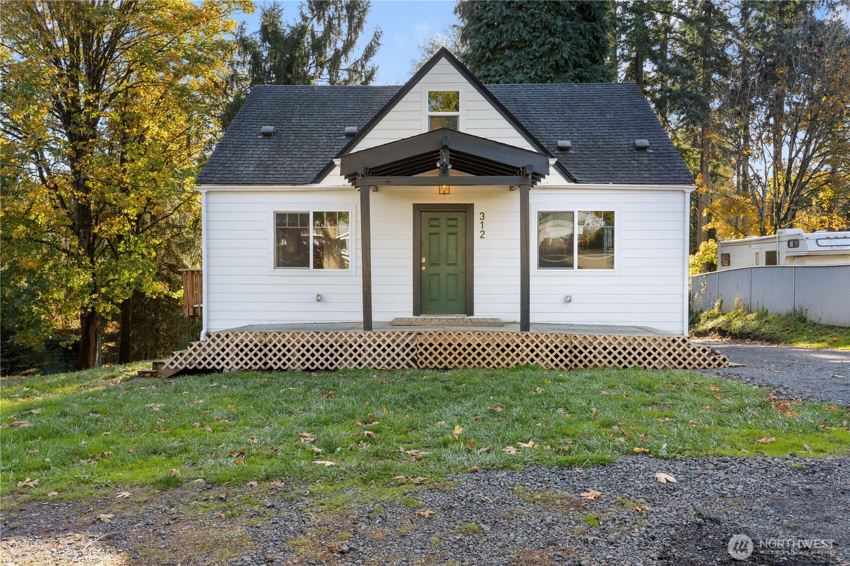 312 Nevada Drive Longview, WA 98632 - Photo 3 of 27 a front view of a house with a garden