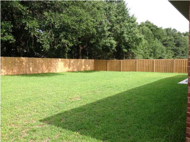 5276 Moore Loop Crestview, FL 32536 - Photo 3 of 16 a view of a back yard