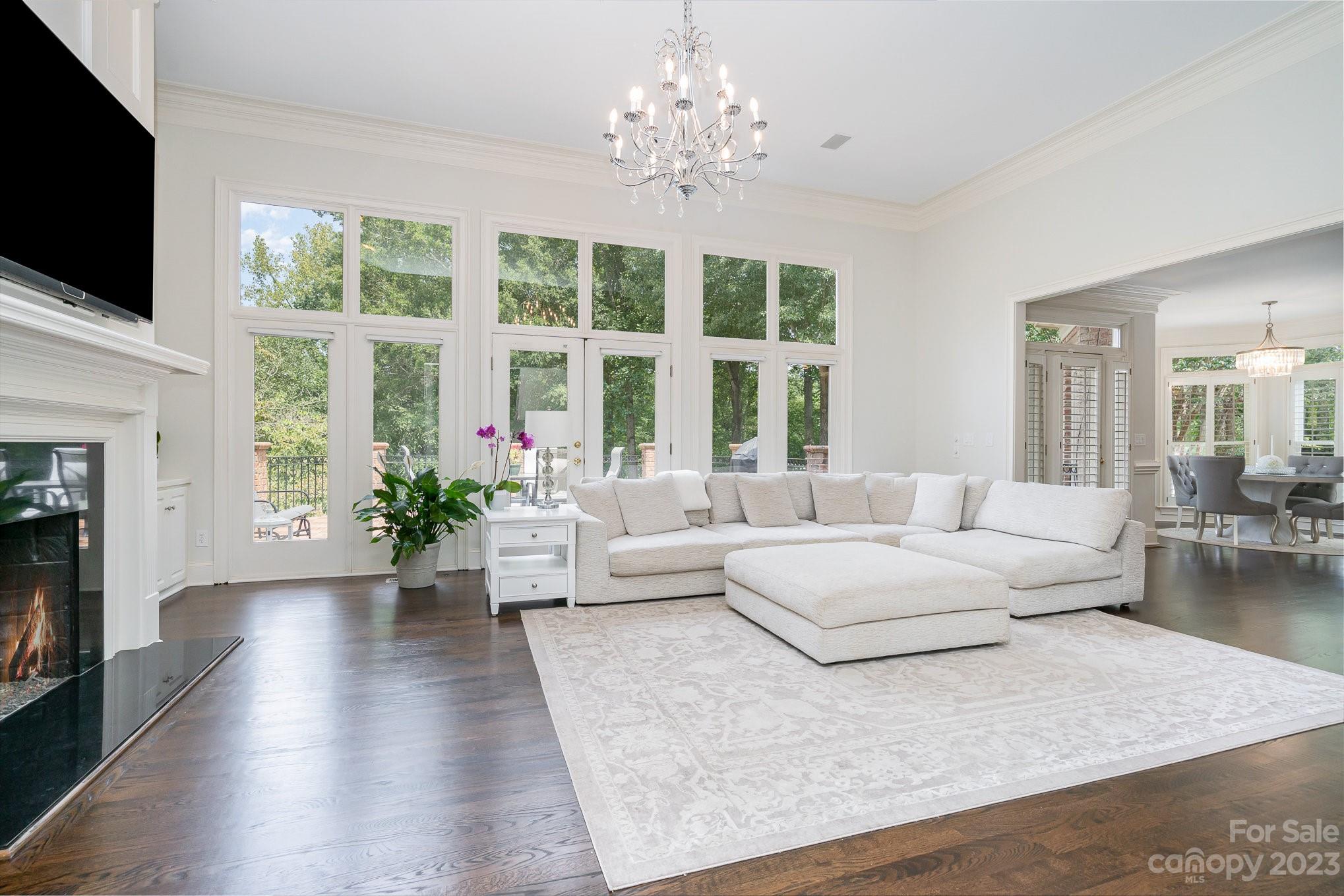 6535 Seton House Lane Charlotte, NC 28277 - Photo 11 of 48 a living room with furniture fireplace and flat screen tv