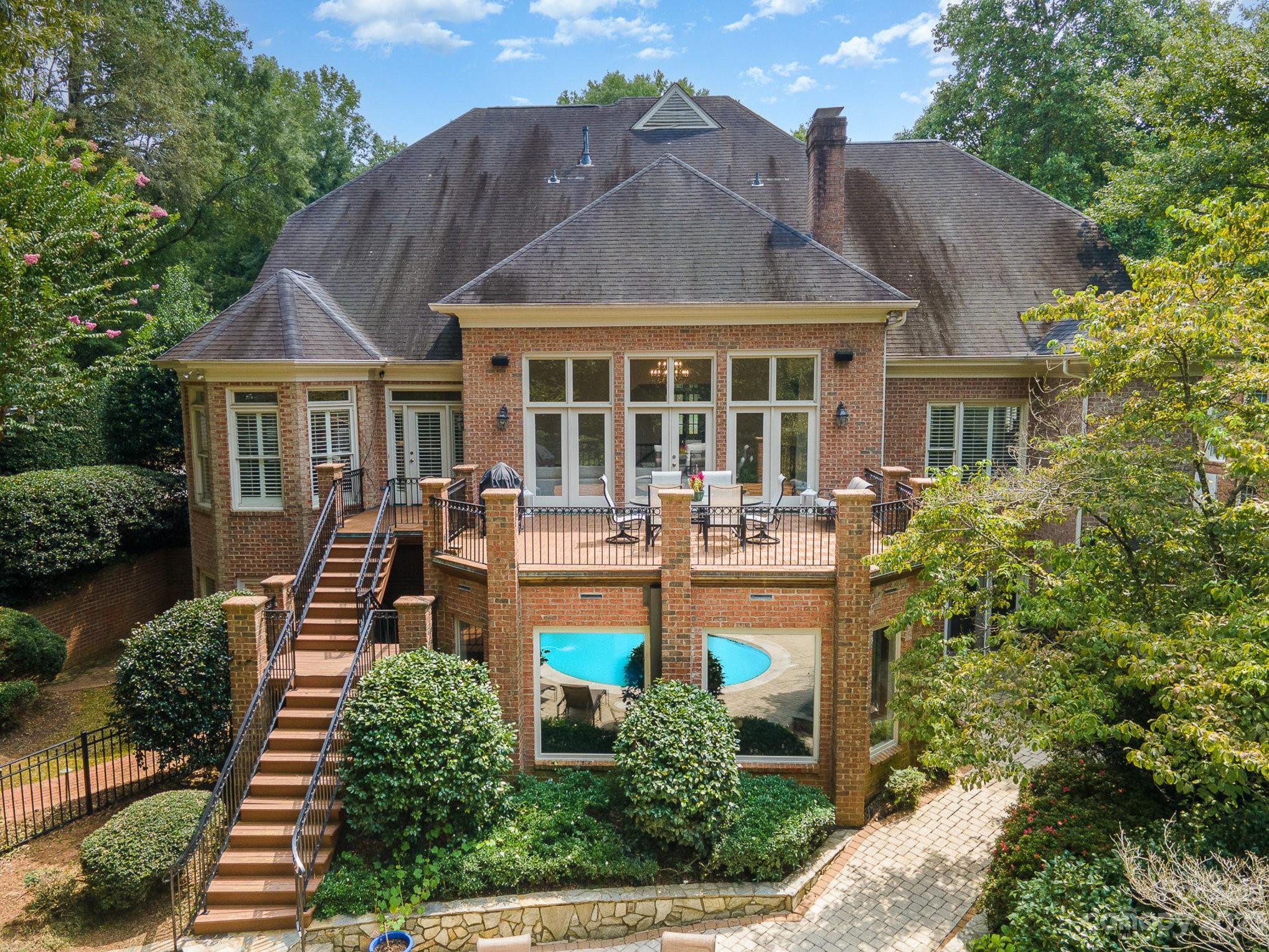 6535 Seton House Lane Charlotte, NC 28277 - Photo 38 of 48 an aerial view of a house with swimming pool garden and patio