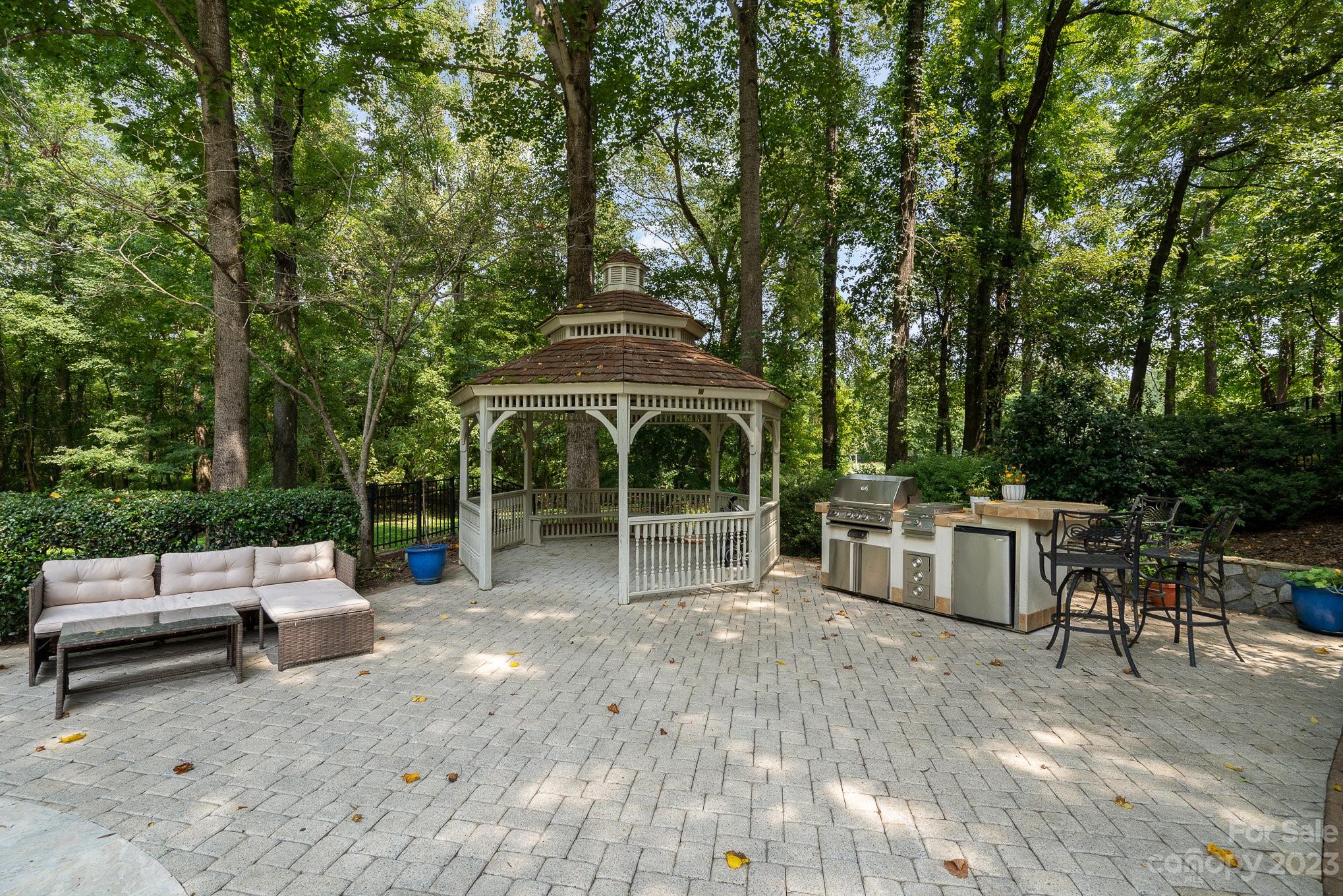 6535 Seton House Lane Charlotte, NC 28277 - Photo 41 of 48 a view of house with swimming pool and sitting area