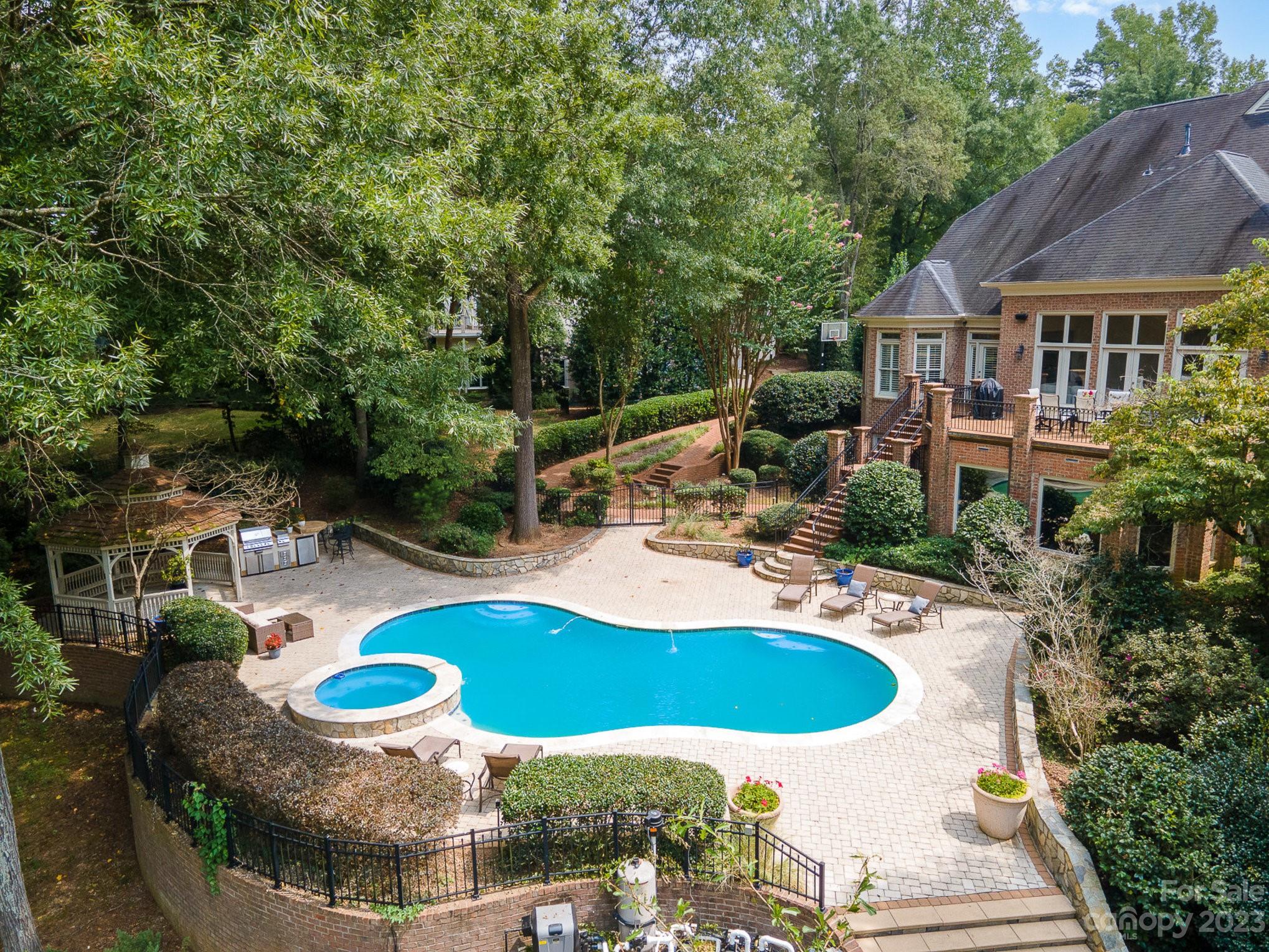 6535 Seton House Lane Charlotte, NC 28277 - Photo 43 of 48 a view of a house with swimming pool