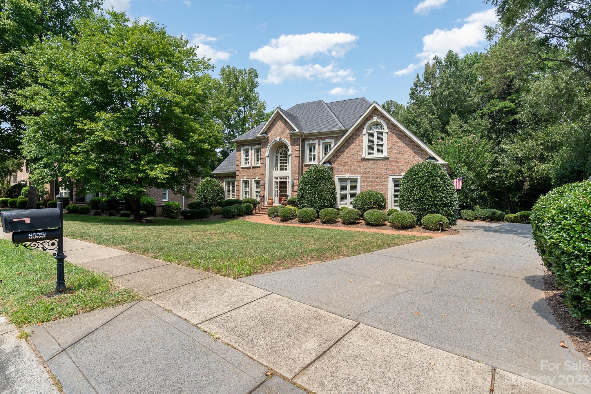 6535 Seton House Lane Charlotte, NC 28277 - Photo 47 of 48 a house view with a garden space