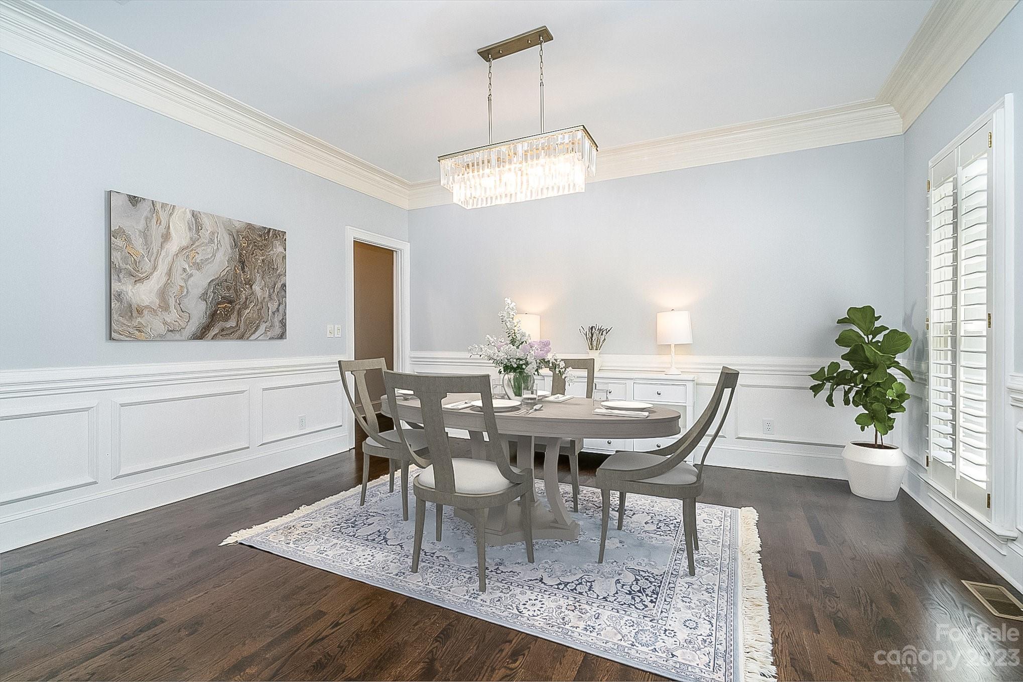 6535 Seton House Lane Charlotte, NC 28277 - Photo 7 of 48 a view of a dining room with furniture and wooden floor