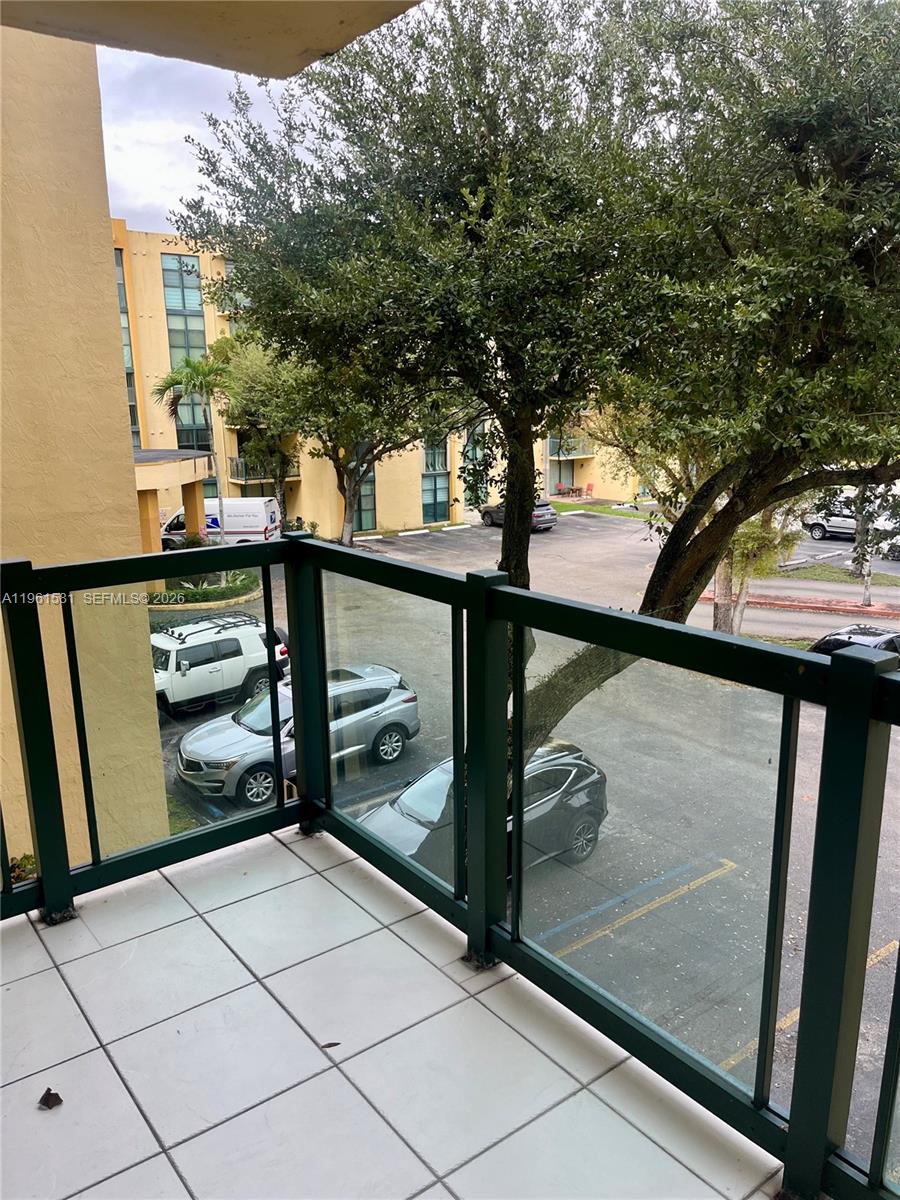 11800 Southwest 18th Street, Unit 3074 Miami, FL 33175 - Photo 14 of 14 a view of a glass door and a window