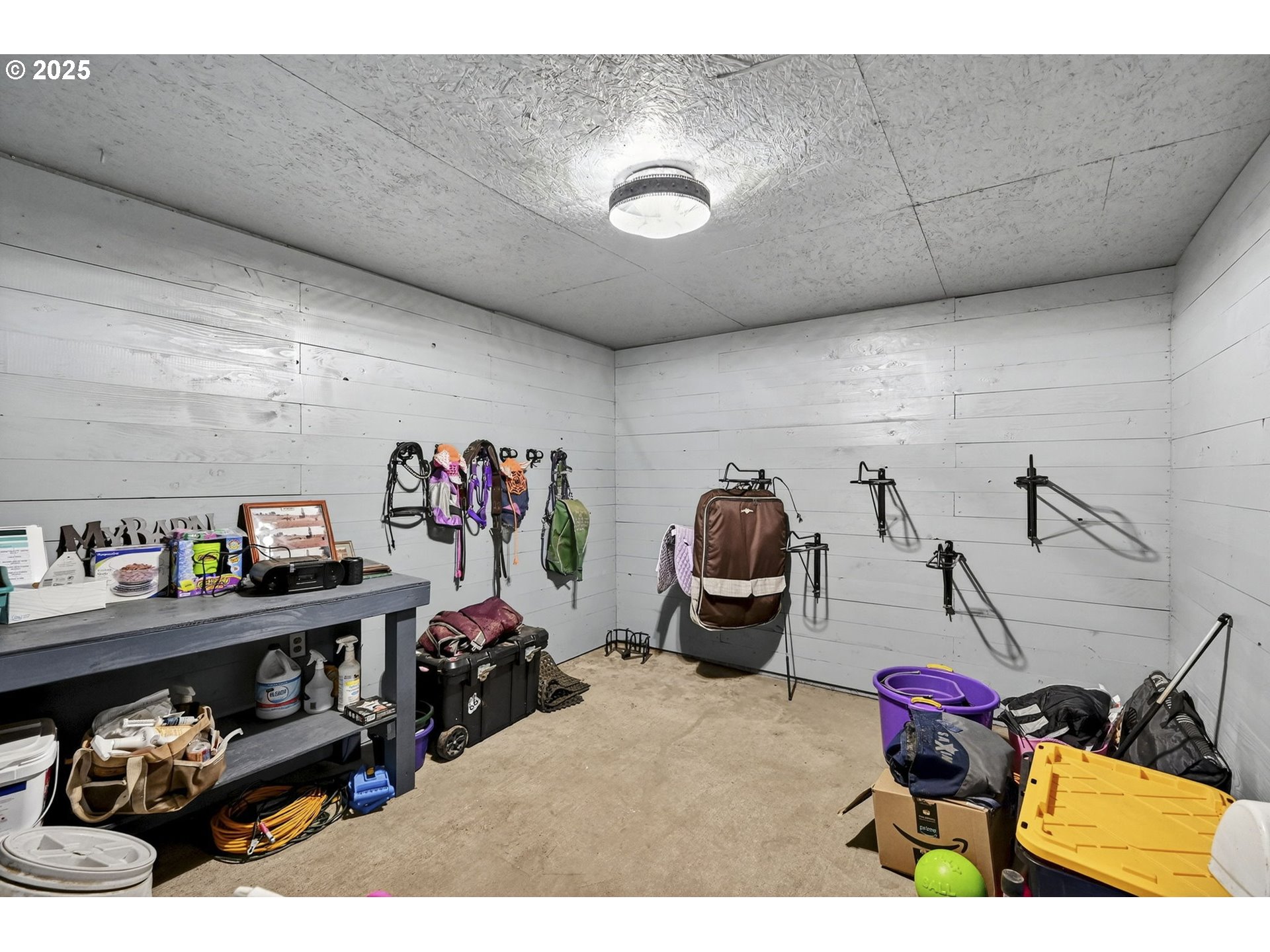 416 Coulson Road Chehalis, WA 98532 - Photo 11 of 46 a living room with lots of furniture and clutter