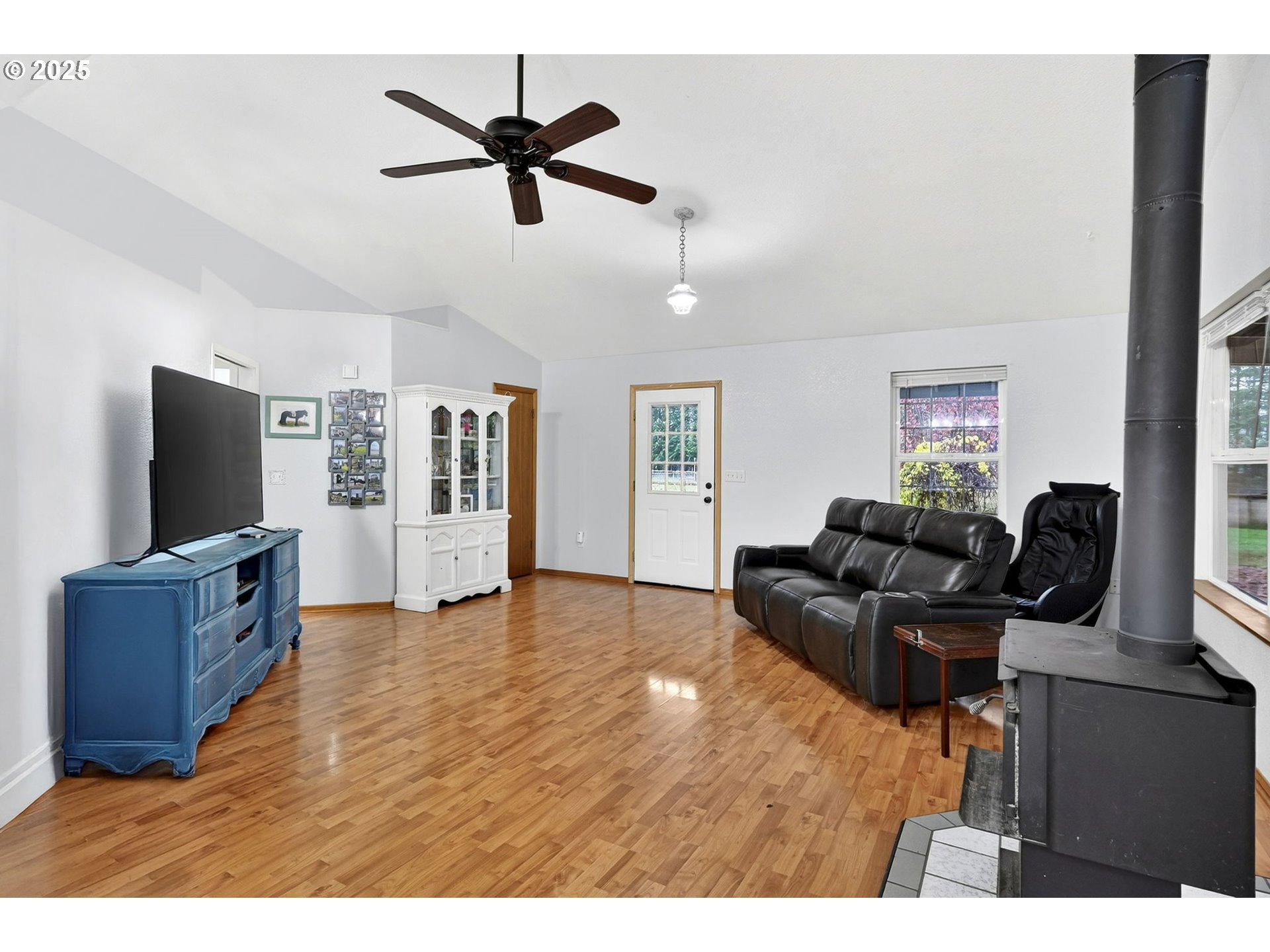 416 Coulson Road Chehalis, WA 98532 - Photo 23 of 46 a living room with furniture and a flat screen tv