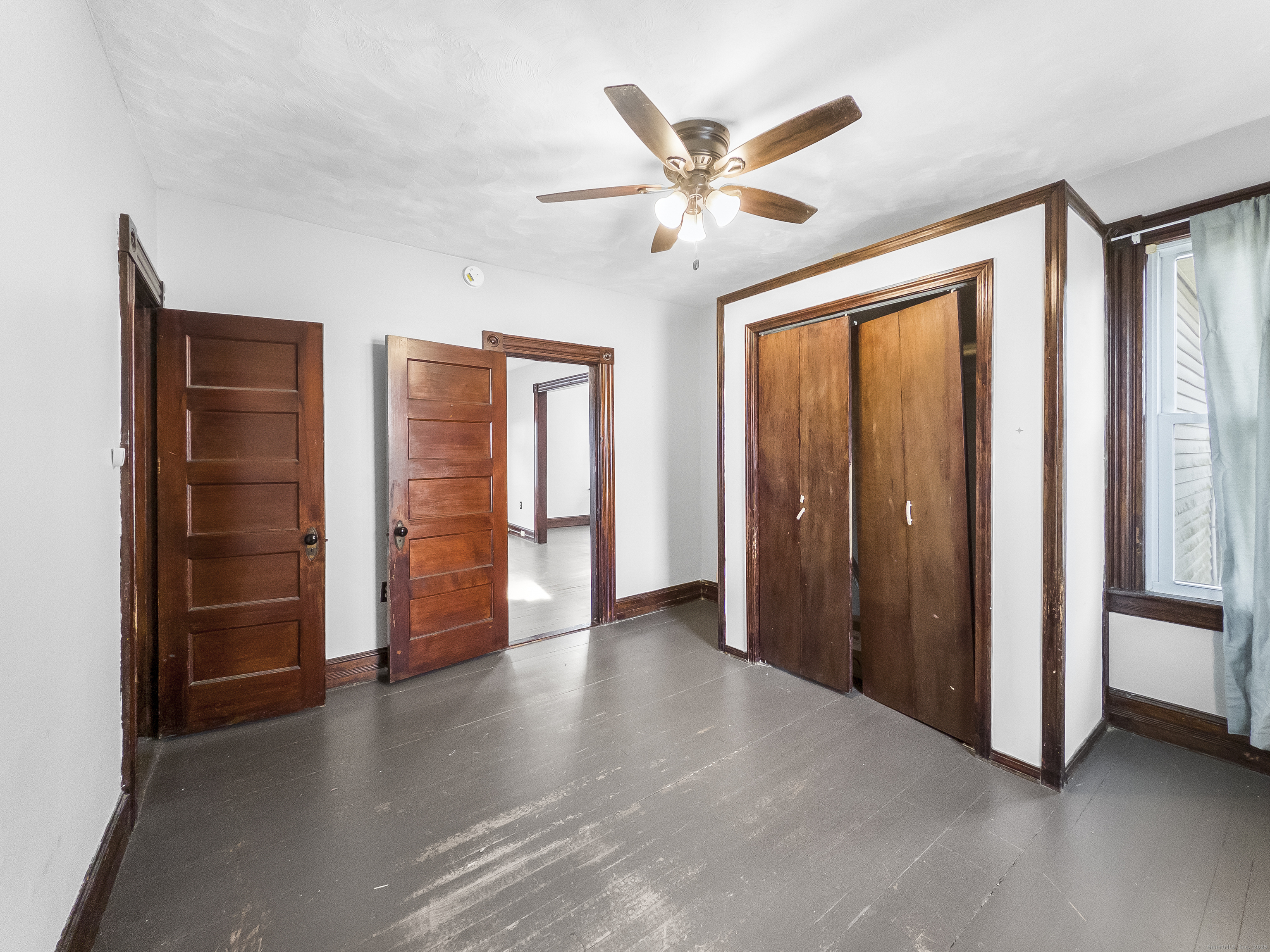 634 High Street, Unit 2 Middletown, CT 06457 - Photo 12 of 15 a view of a livingroom with wooden floor and entryway