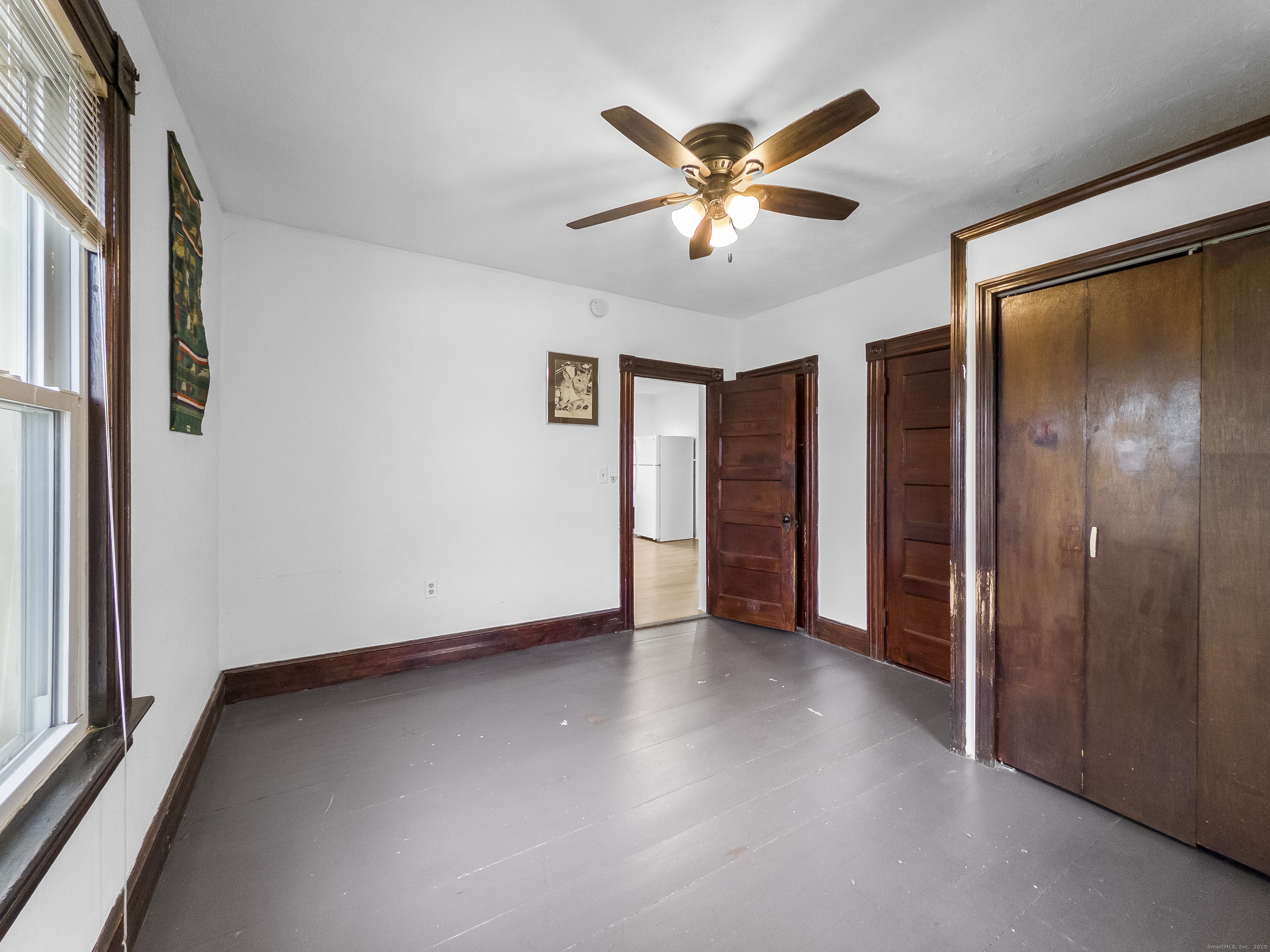 634 High Street, Unit 2 Middletown, CT 06457 - Photo 14 of 15 a view of a livingroom with a ceiling fan and window