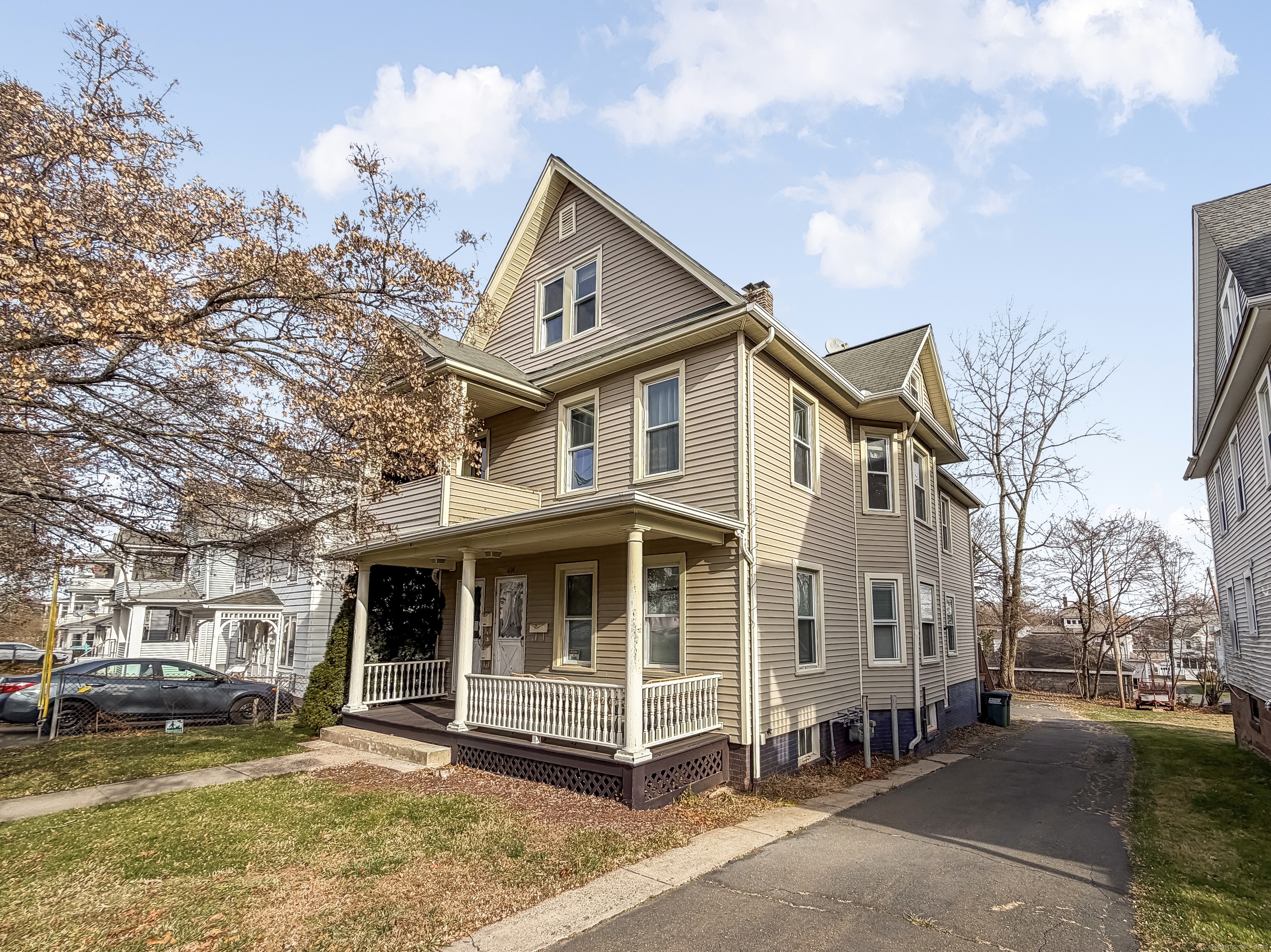 634 High Street, Unit 2 Middletown, CT 06457 - Photo 15 of 15 a front view of a house with a yard